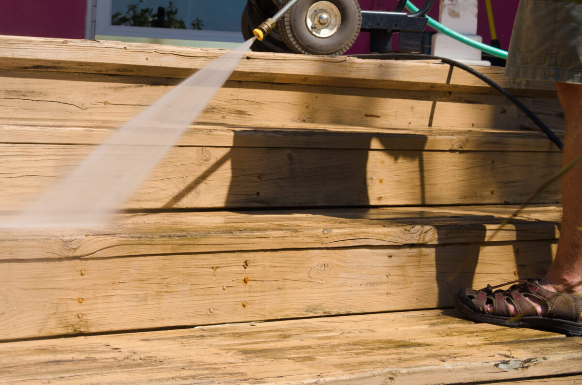 Restore Your Home’s Beauty with Professional Pressure Washing and wood staining deck services