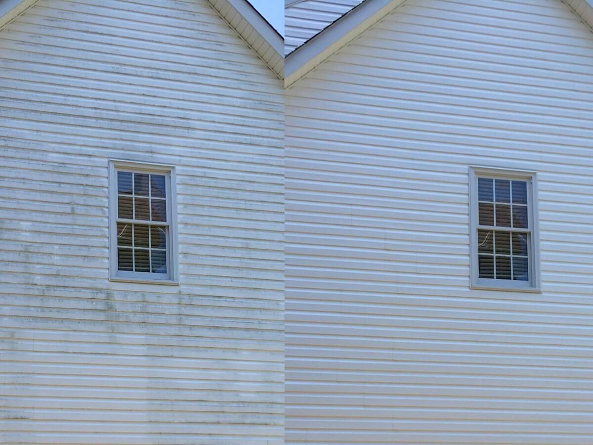 Before and after of a large vinyl-sided home with dirt, green algae, and black streaks removed through expert pressure washing.