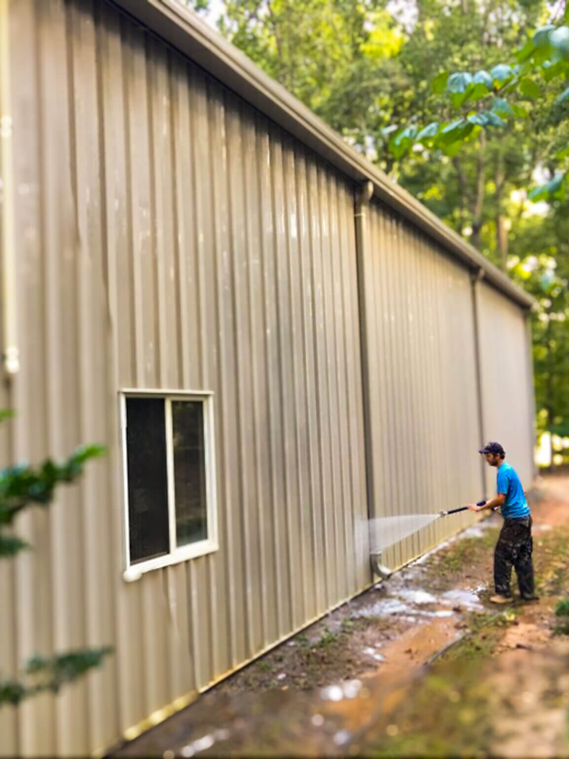 Commercial pressure washing service in action. Professional cleaning results.