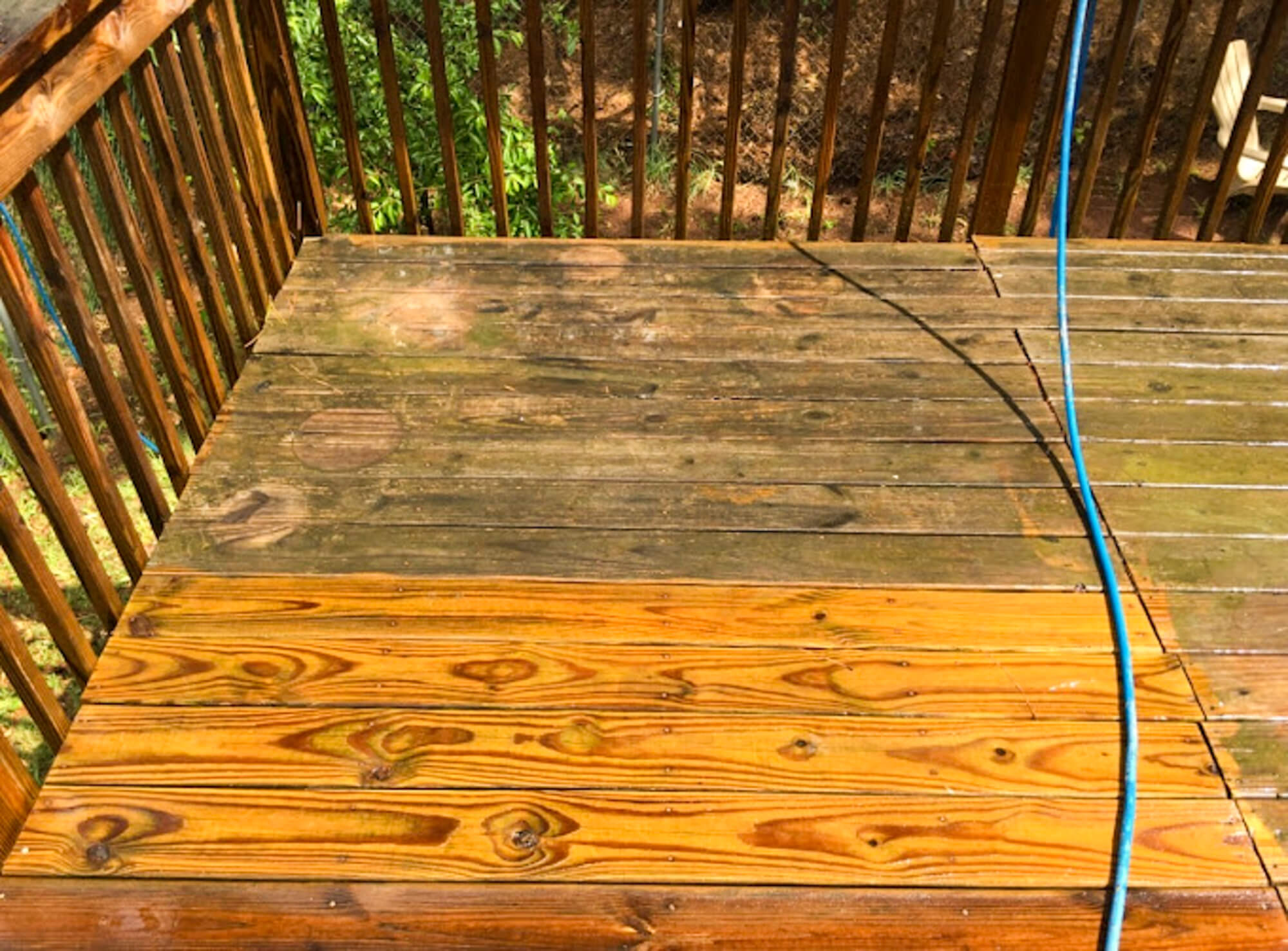 before and after a deck pressure washing and deck stain and seal service