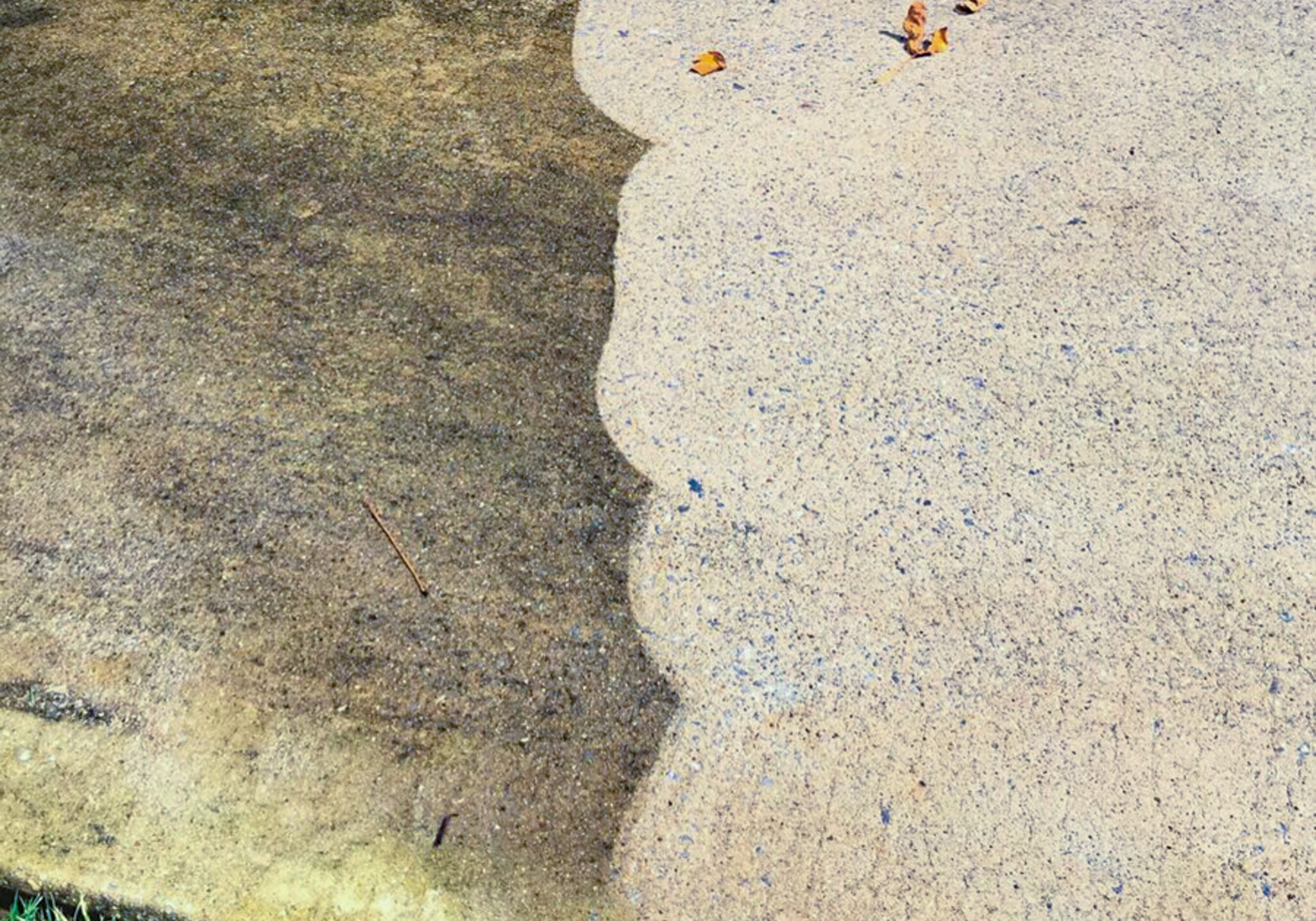 before and after - professional concrete pressure washing and concrete sealing service