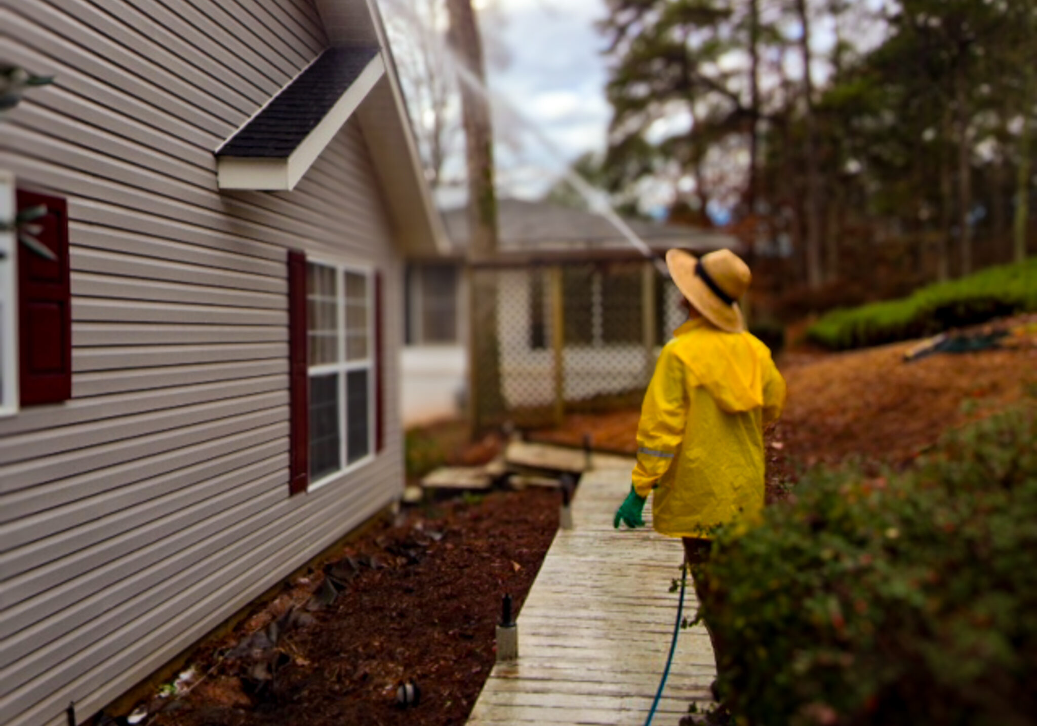 Professional exterior home washing service removing dirt and grime from siding. Expert home pressure washing near you.